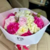 A colorful bouquet of fresh flowers resting on a car seat, enhancing the ambiance of the vehicle with natural beauty.